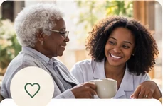 Family member sharing a gentle moment with an older loved one